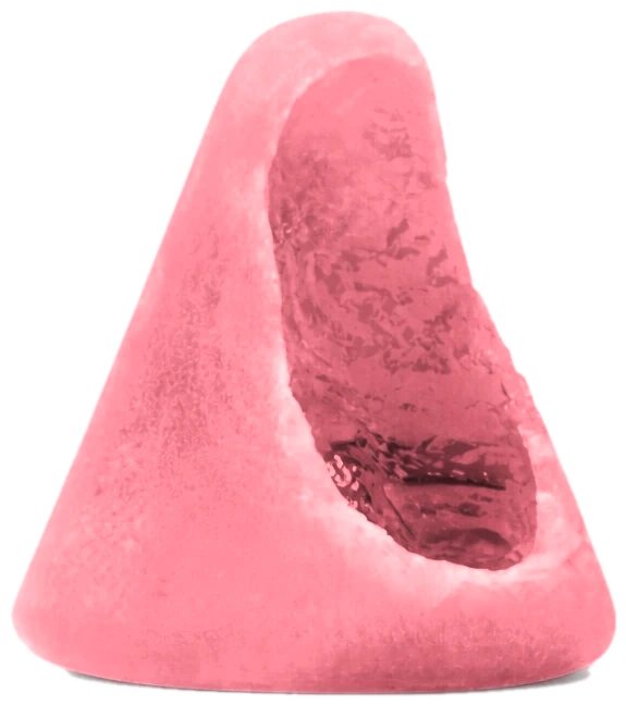 A Peach Aura Gem bitten open, showing the gooey center